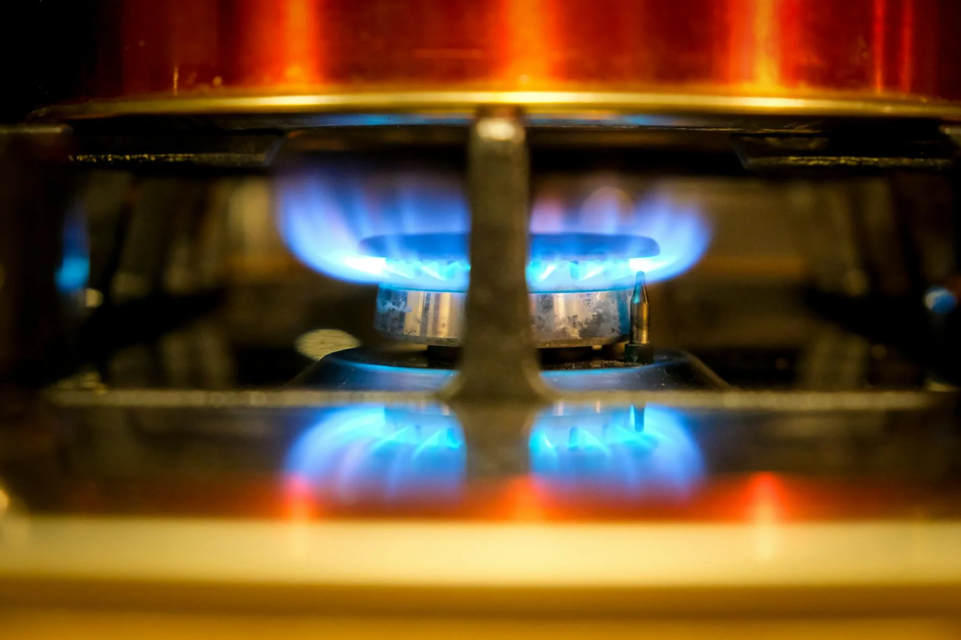 Gas flame on a stove, symbol for the German gas basic supply (Grundversorgung)